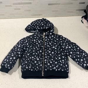 Reversible jacket tucked in hoodie